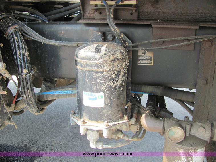 image for item 6958 2001 Peterbilt Conventional 330 tandem axle dump truck