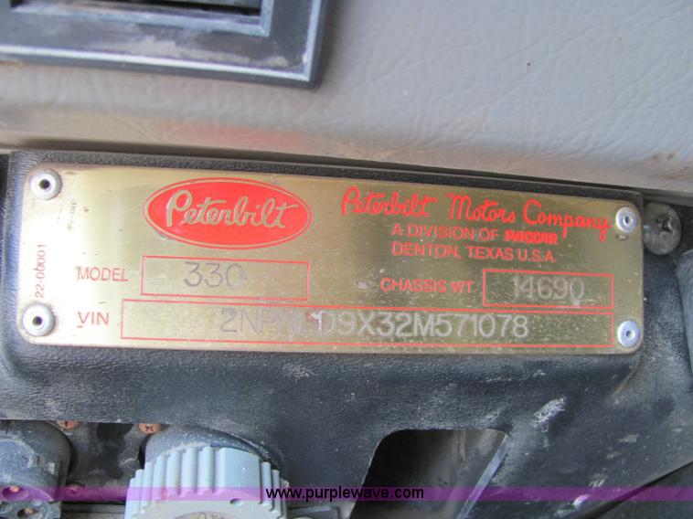 image for item 6958 2001 Peterbilt Conventional 330 tandem axle dump truck