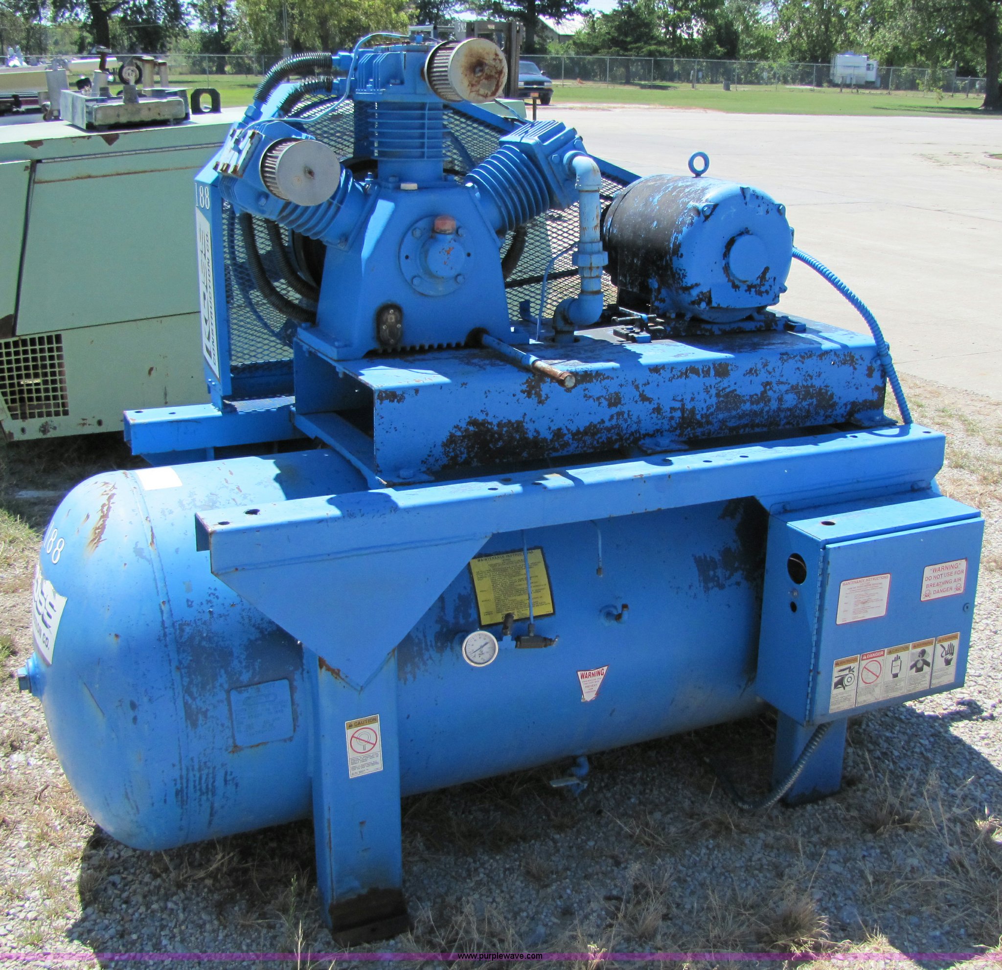 Curtis air compressor in Topeka, KS Item 7198 sold Purple Wave