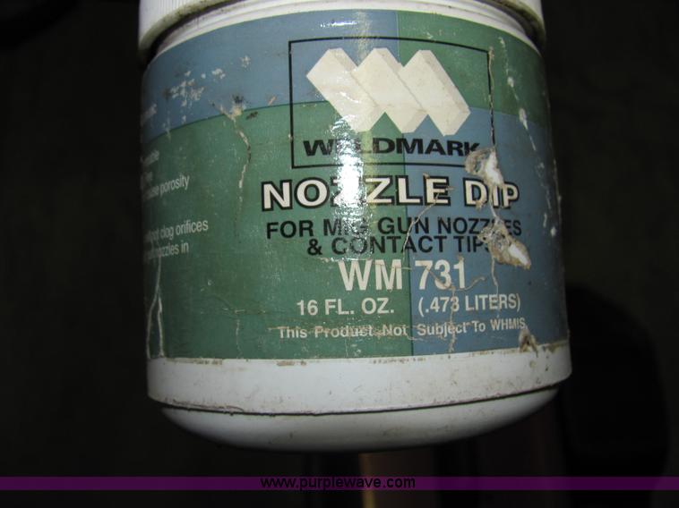 image for item 2251 Lincoln 110 mig welder with helmet