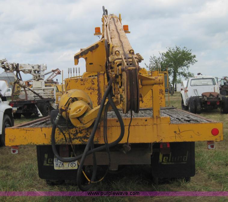 image for item 3161 1969 Ford 750 truck with utility equipment bed and hydraulic drill