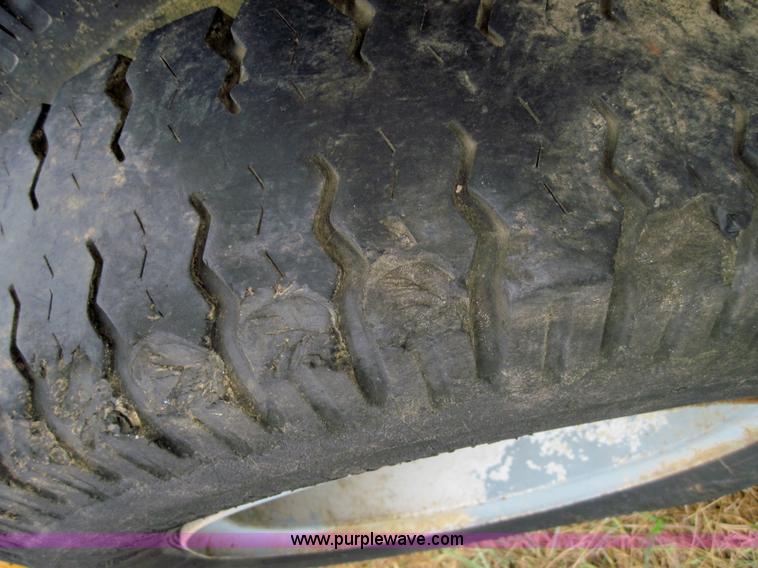 image for item 3161 1969 Ford 750 truck with utility equipment bed and hydraulic drill