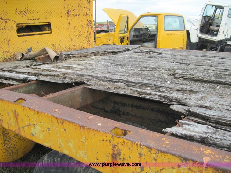 image for item 3161 1969 Ford 750 truck with utility equipment bed and hydraulic drill