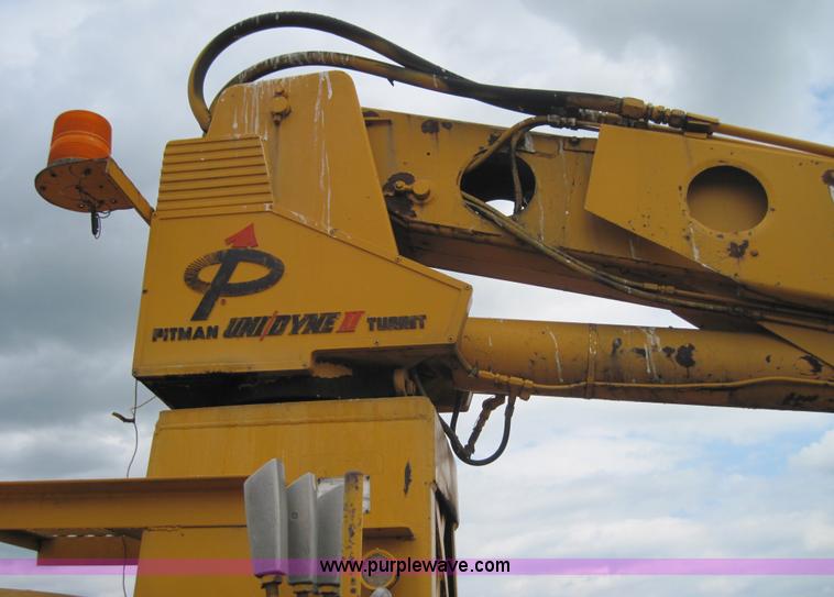 image for item 3161 1969 Ford 750 truck with utility equipment bed and hydraulic drill