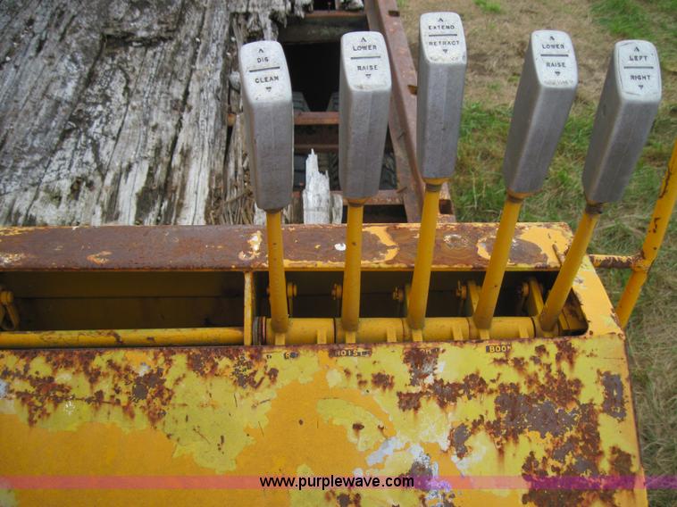 image for item 3161 1969 Ford 750 truck with utility equipment bed and hydraulic drill