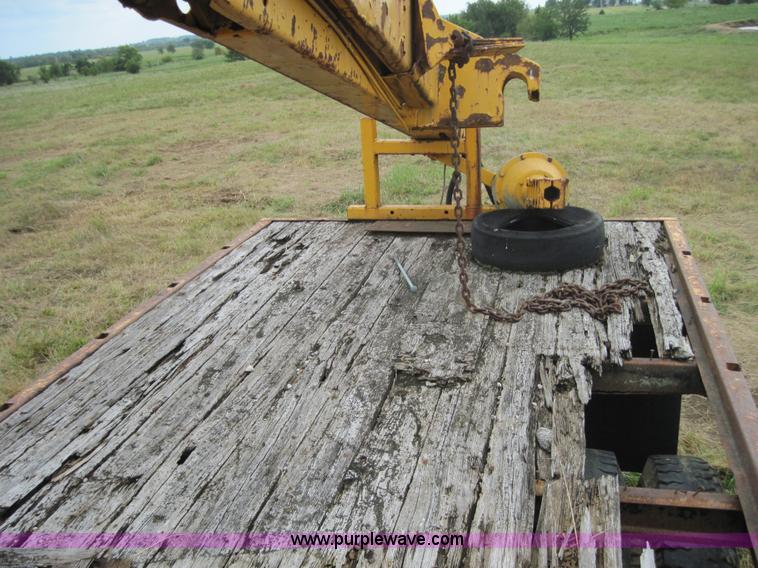 image for item 3161 1969 Ford 750 truck with utility equipment bed and hydraulic drill