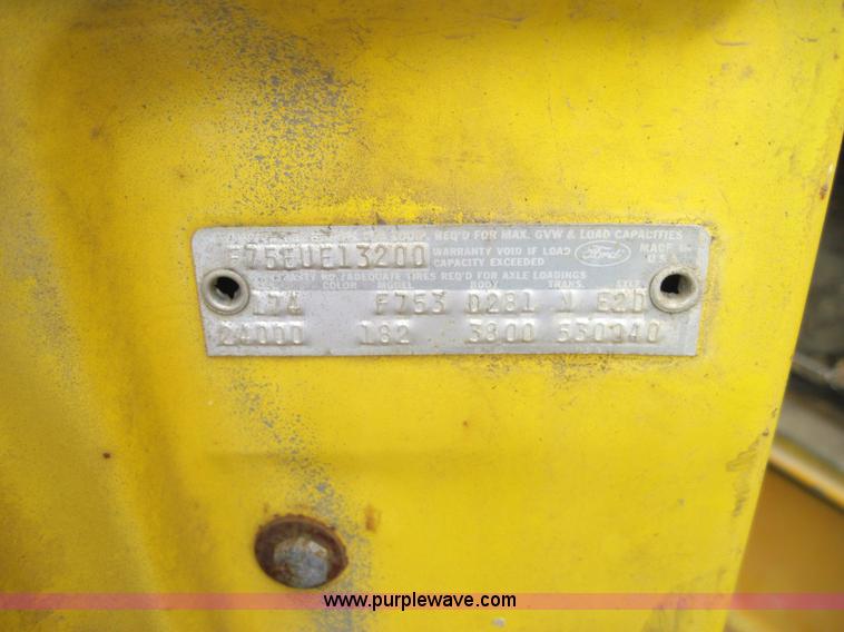 image for item 3161 1969 Ford 750 truck with utility equipment bed and hydraulic drill