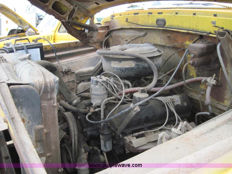 image for item 3161 1969 Ford 750 truck with utility equipment bed and hydraulic drill