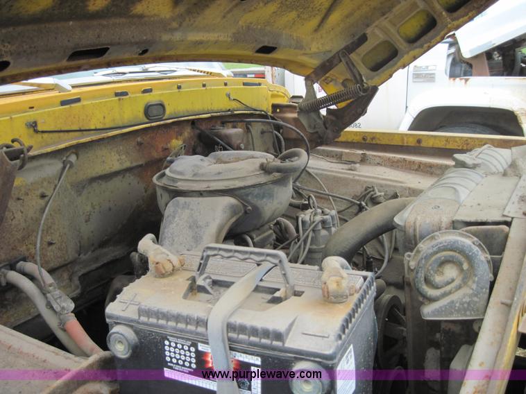 image for item 3161 1969 Ford 750 truck with utility equipment bed and hydraulic drill