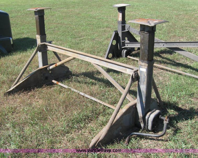 image for item 2275 Holland semi trailer landing gear