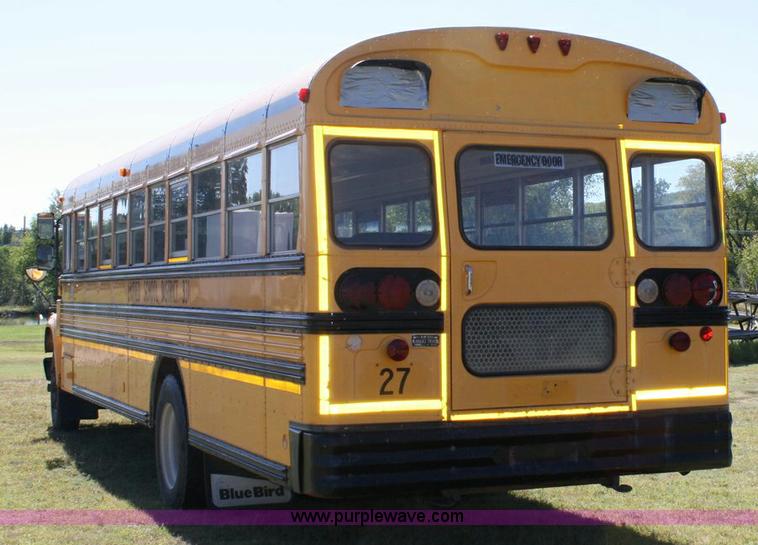 image for item 6329 1997 Ford B800 Blue Bird 59 passenger bus