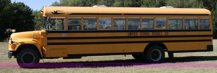 image for item 6329 1997 Ford B800 Blue Bird 59 passenger bus