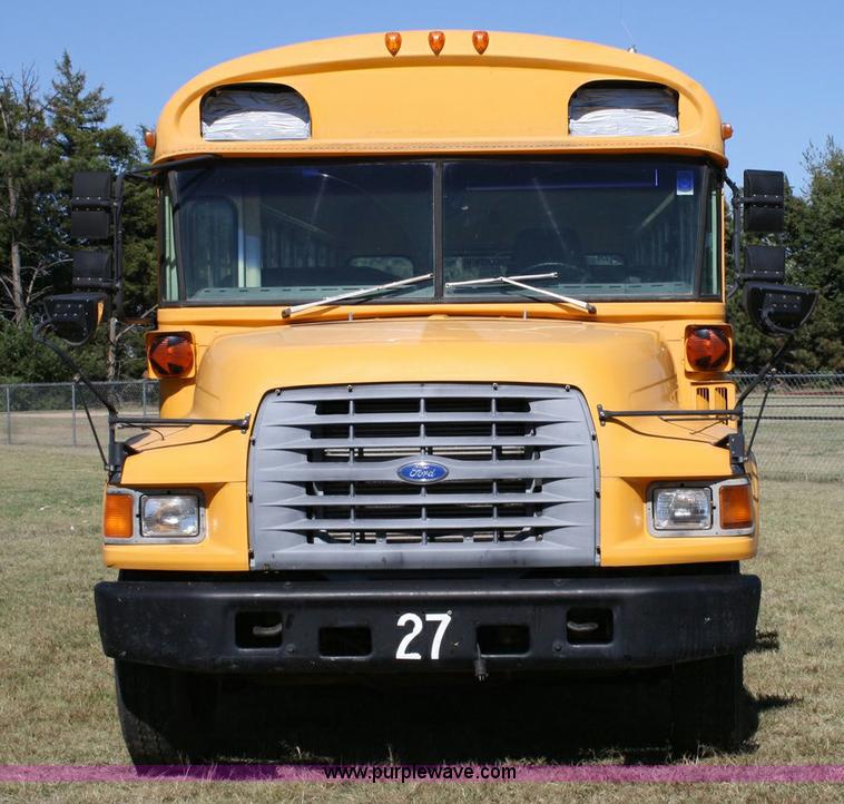 image for item 6329 1997 Ford B800 Blue Bird 59 passenger bus