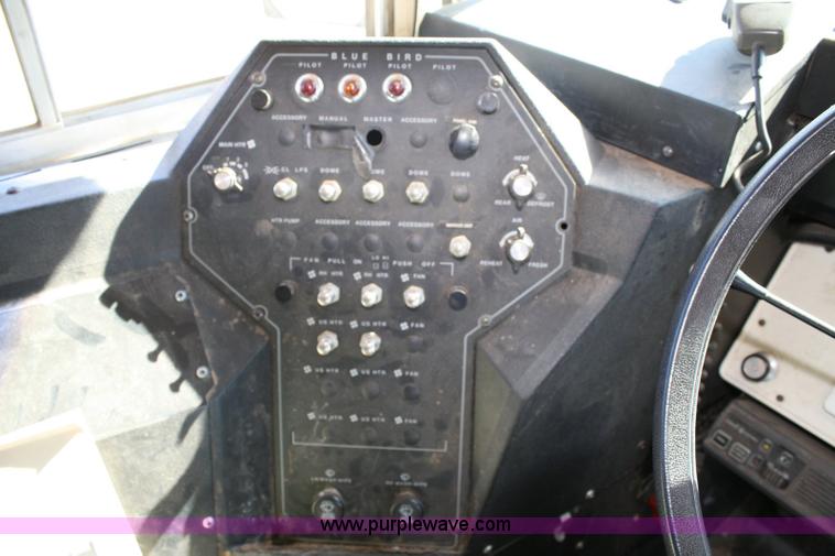 image for item 6329 1997 Ford B800 Blue Bird 59 passenger bus