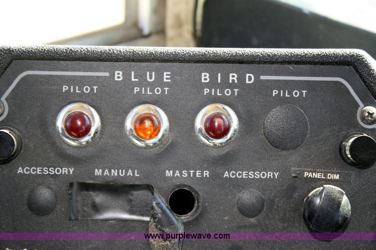 image for item 6329 1997 Ford B800 Blue Bird 59 passenger bus