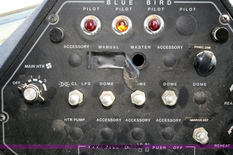 image for item 6329 1997 Ford B800 Blue Bird 59 passenger bus