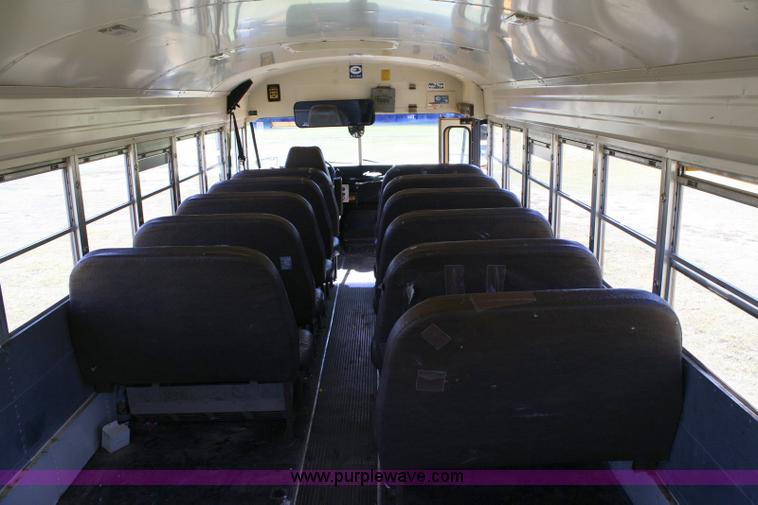 image for item 6329 1997 Ford B800 Blue Bird 59 passenger bus