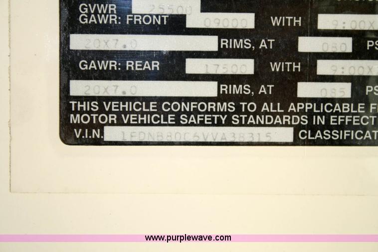 image for item 6329 1997 Ford B800 Blue Bird 59 passenger bus