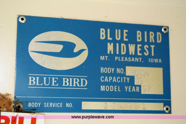 image for item 6329 1997 Ford B800 Blue Bird 59 passenger bus