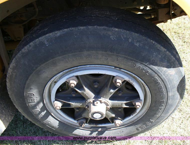 image for item 6329 1997 Ford B800 Blue Bird 59 passenger bus