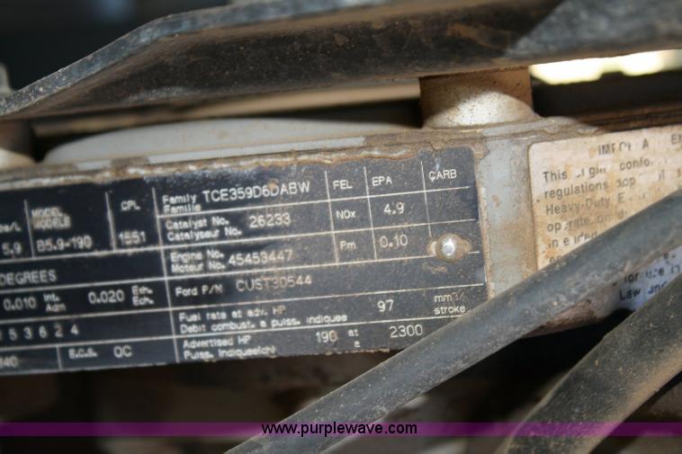 image for item 6329 1997 Ford B800 Blue Bird 59 passenger bus