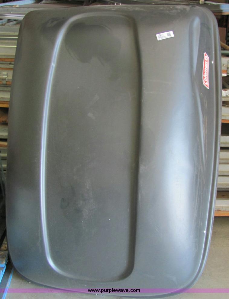 Coleman car top carrier in McPherson, KS Item 6961 sold Purple Wave