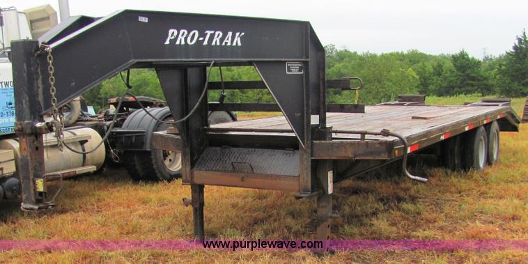 image for item 4863 2001 Pro Trak 24' dual tandem axle gooseneck trailer