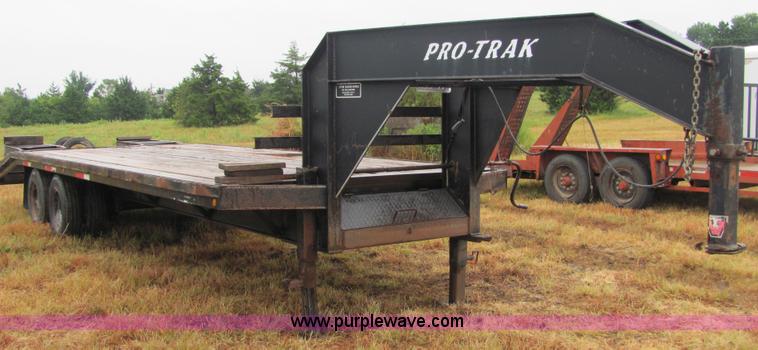 image for item 4863 2001 Pro Trak 24' dual tandem axle gooseneck trailer