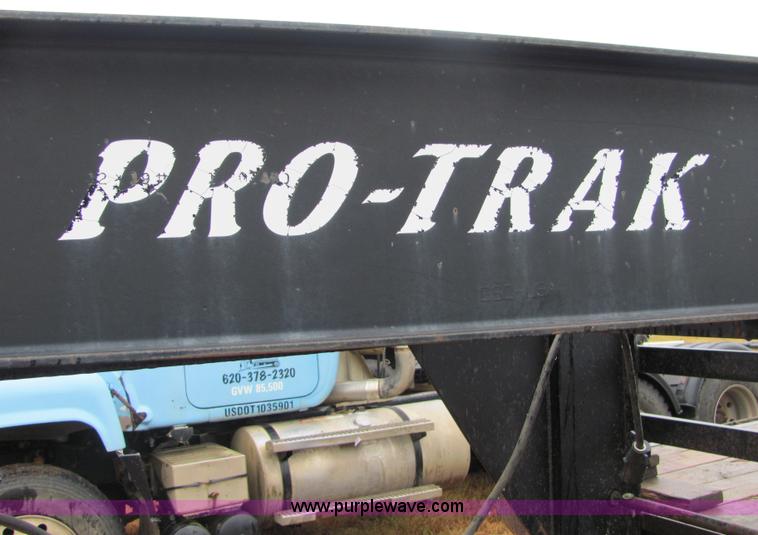 image for item 4863 2001 Pro Trak 24' dual tandem axle gooseneck trailer