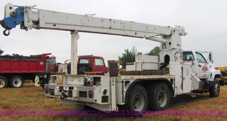 image for item 4869 1997 GMC C8500 boom lift truck