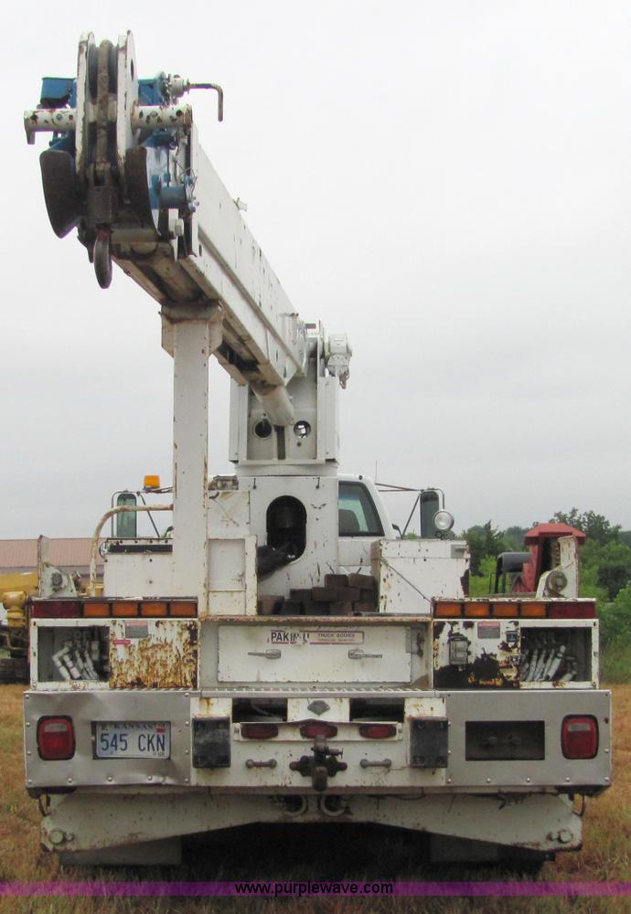 image for item 4869 1997 GMC C8500 boom lift truck