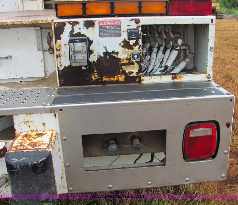 image for item 4869 1997 GMC C8500 boom lift truck