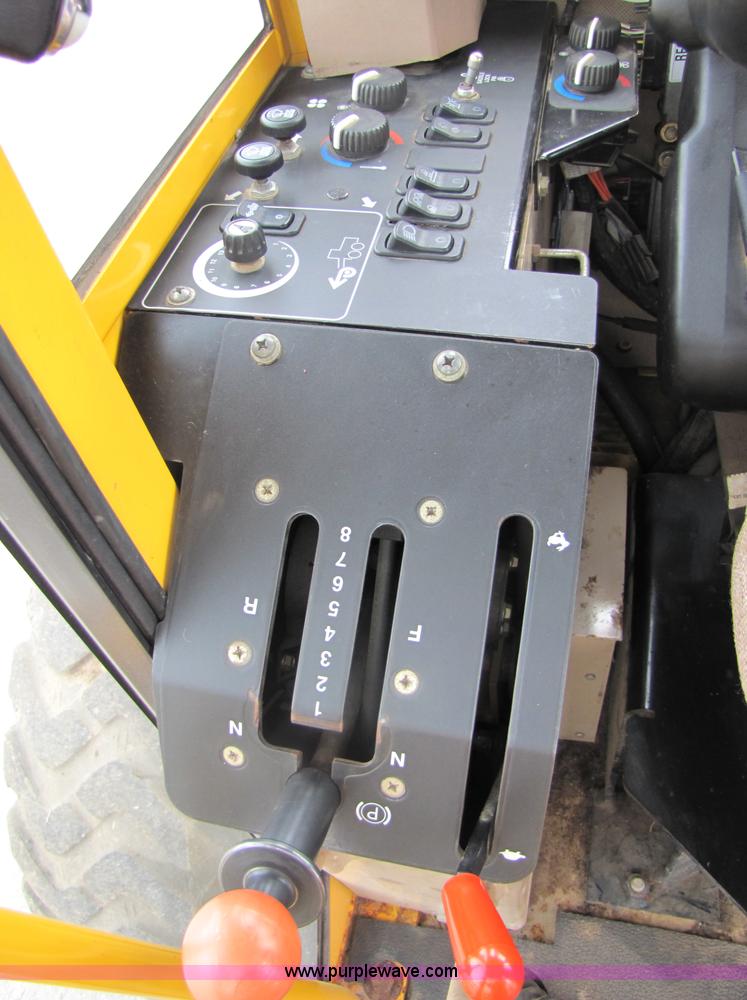 image for item 5230 1999 John Deere 772CH motor grader