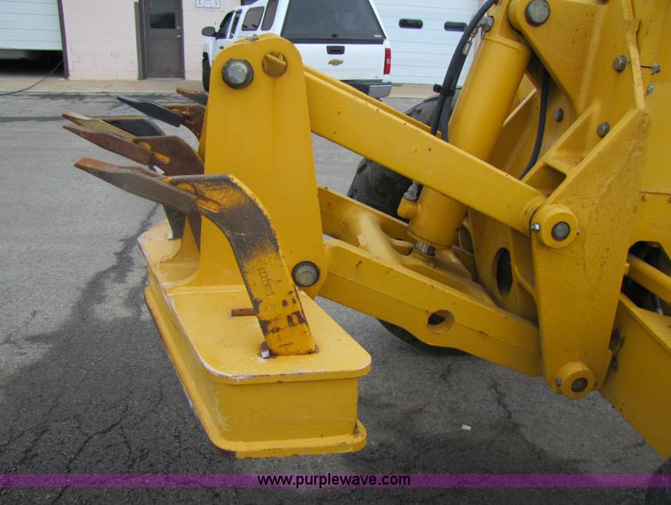 image for item 5230 1999 John Deere 772CH motor grader