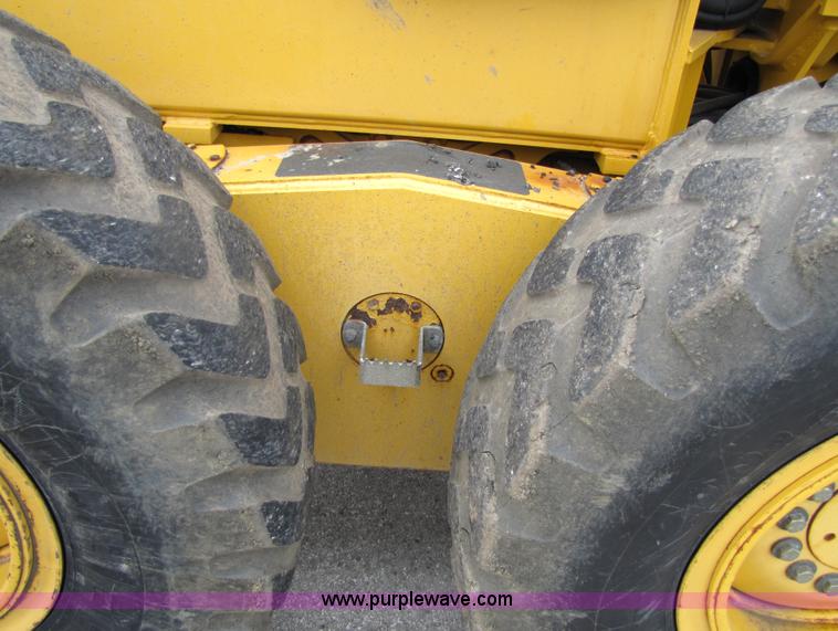 image for item 5230 1999 John Deere 772CH motor grader