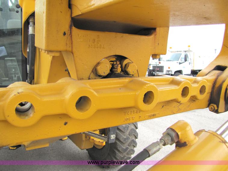 image for item 5230 1999 John Deere 772CH motor grader