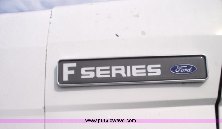 image for item 5863 1996 Ford F700 semi truck