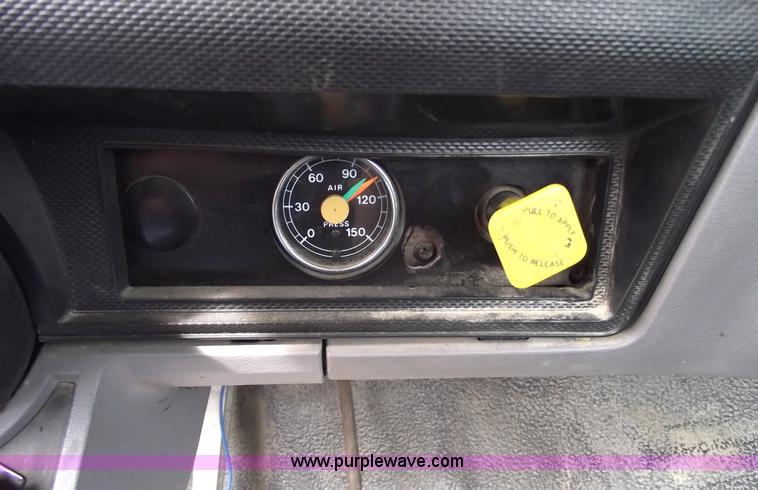 image for item 5863 1996 Ford F700 semi truck