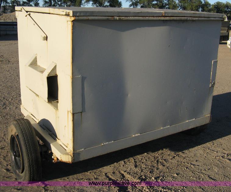 image for item 8007 Steel trash dumpster mounted on pintle hitch dolly