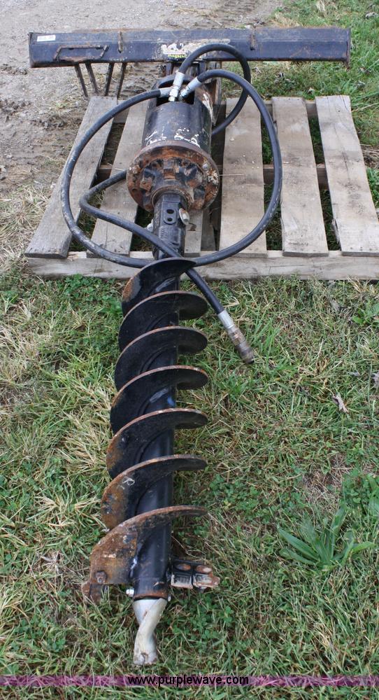 image for item 4674 John Deere post hold digger skid steer attachment