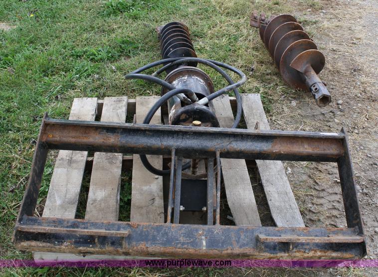 image for item 4674 John Deere post hold digger skid steer attachment
