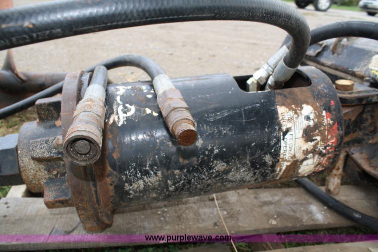 image for item 4674 John Deere post hold digger skid steer attachment