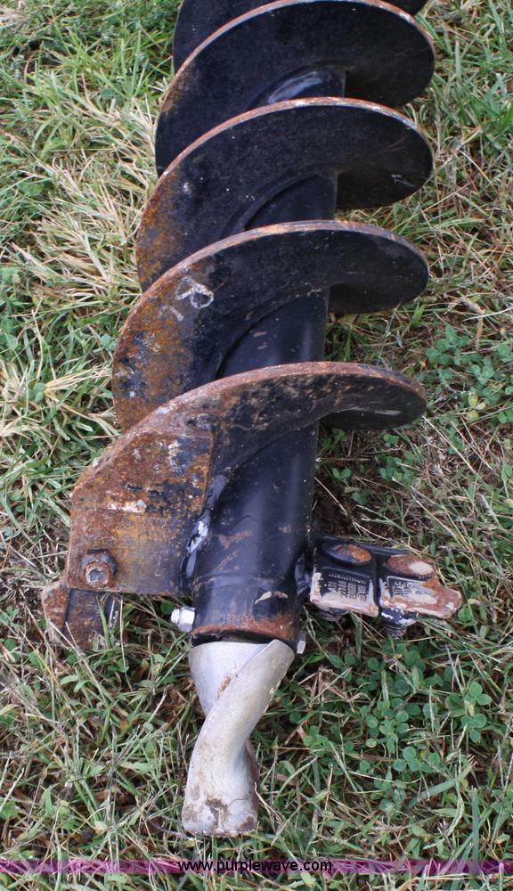 image for item 4674 John Deere post hold digger skid steer attachment