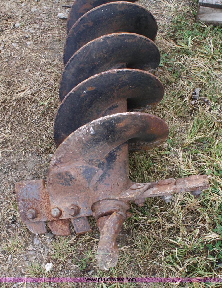 image for item 4674 John Deere post hold digger skid steer attachment