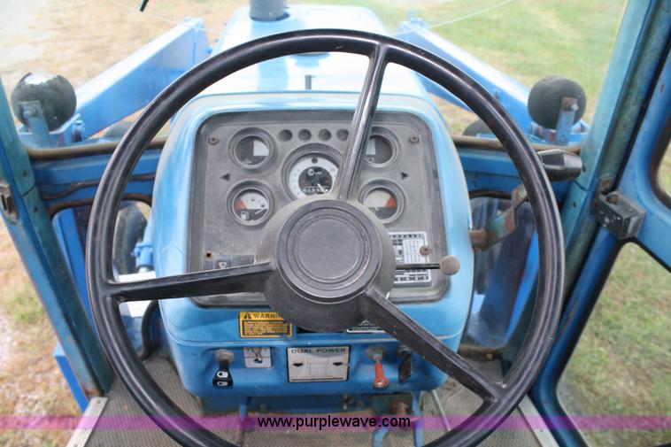 image for item 4679 1983 Ford 7710 tractor with loader