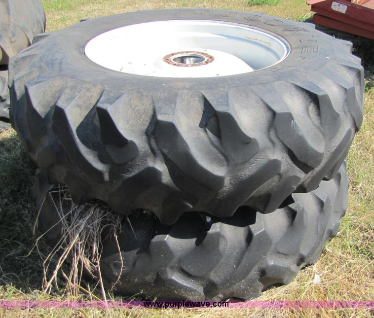 image for item 5171 18.4-34 tires on eight bolt wheels