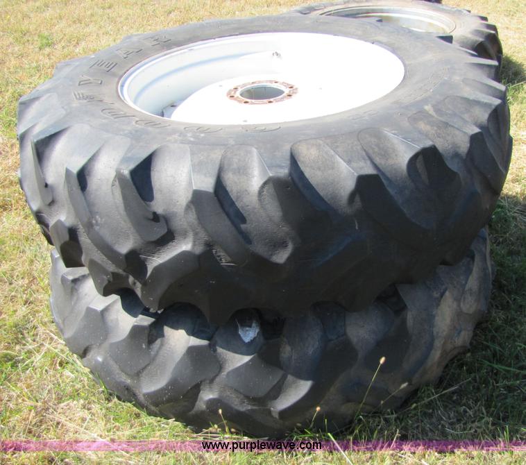 image for item 5171 18.4-34 tires on eight bolt wheels