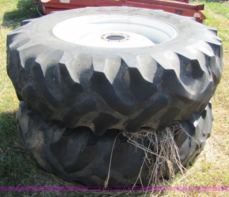 image for item 5171 18.4-34 tires on eight bolt wheels