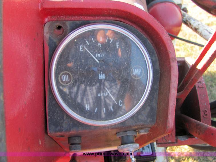 image for item 6560 Farmall F706 tractor with loader