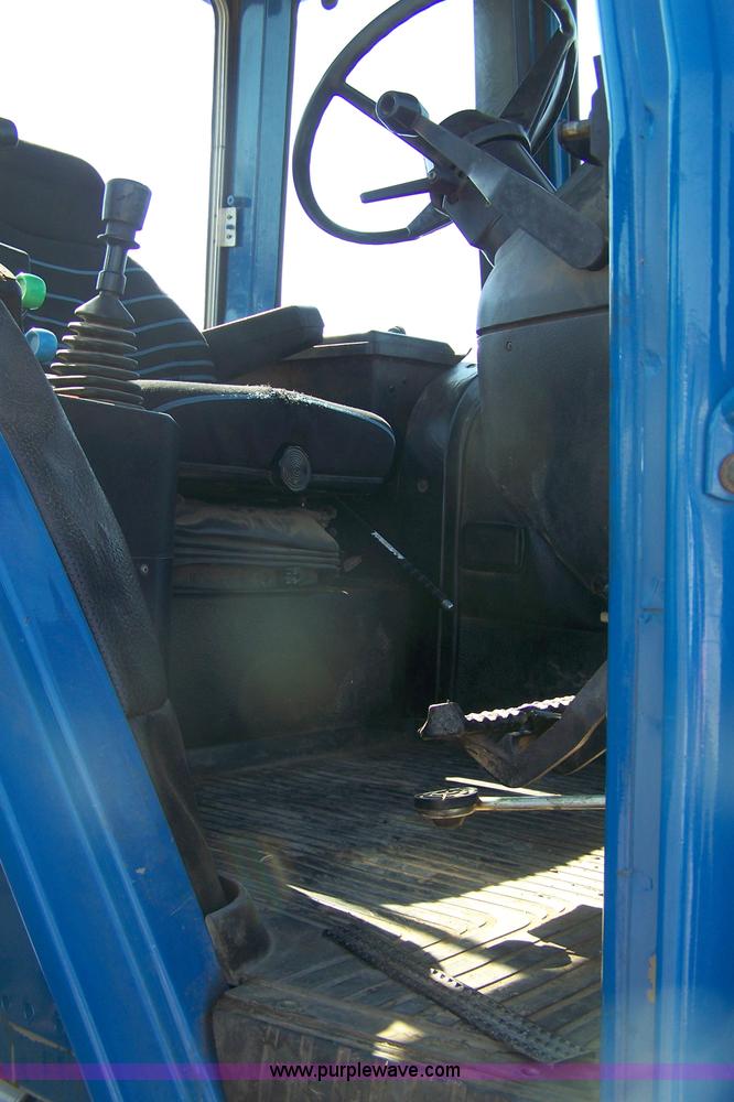 image for item 7400 1990 Ford 8630 tractor with loader